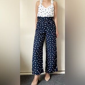 ON •34TH
WIDE LL
HIGH RISE Navy and White Polka Dot Jumpsuit
